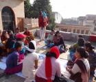 Group meeting with women community members